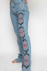 Pernera d' un jeans tipus indígena per a dona